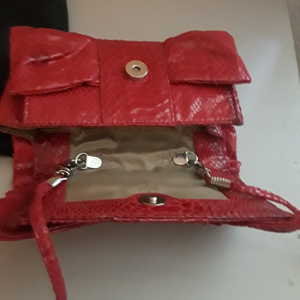 Iman convertible clutch shoulder bag